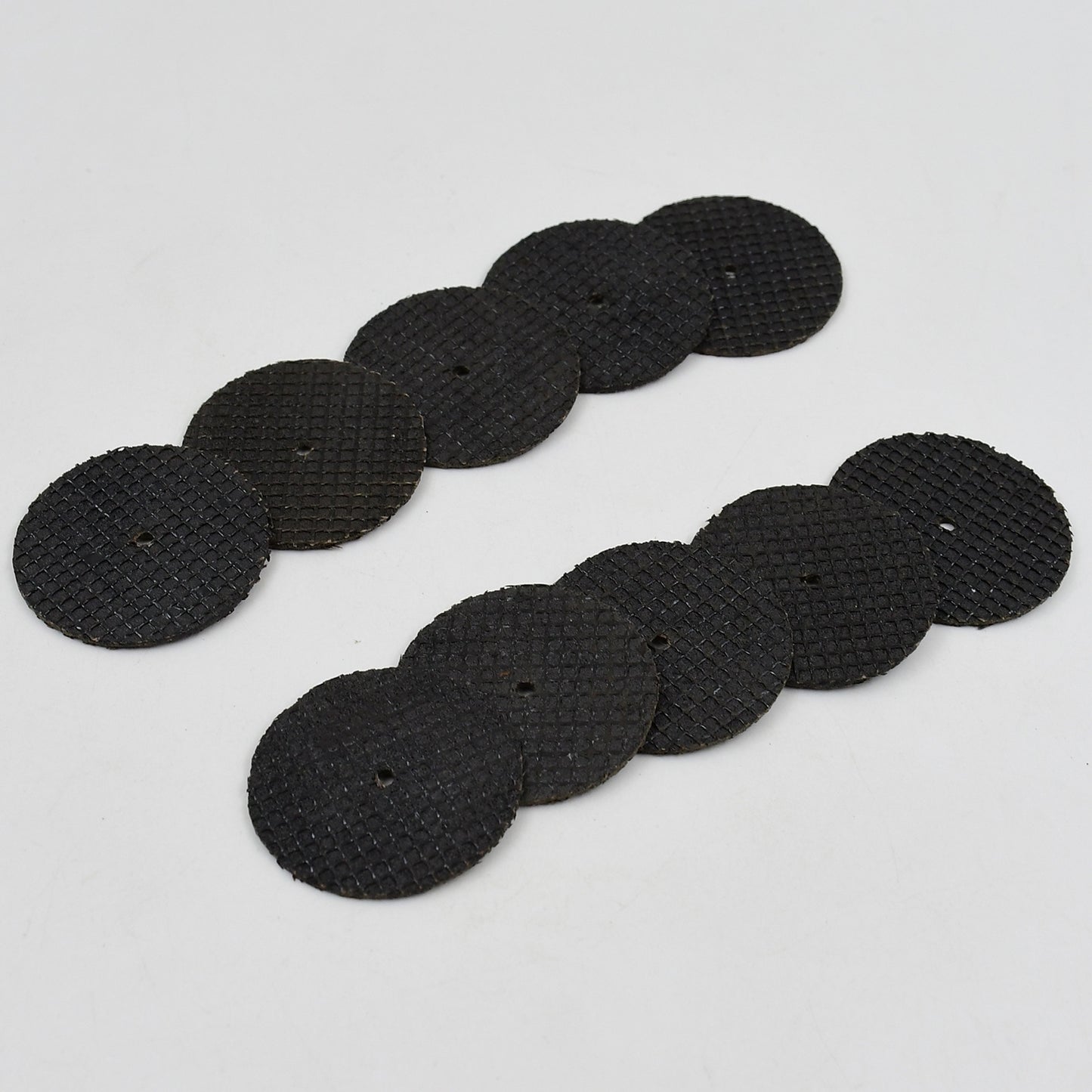 Set of 11 Wukusy grinder cutting disc tools for home improvement, featuring various grinding and cutting accessories for power tools.
