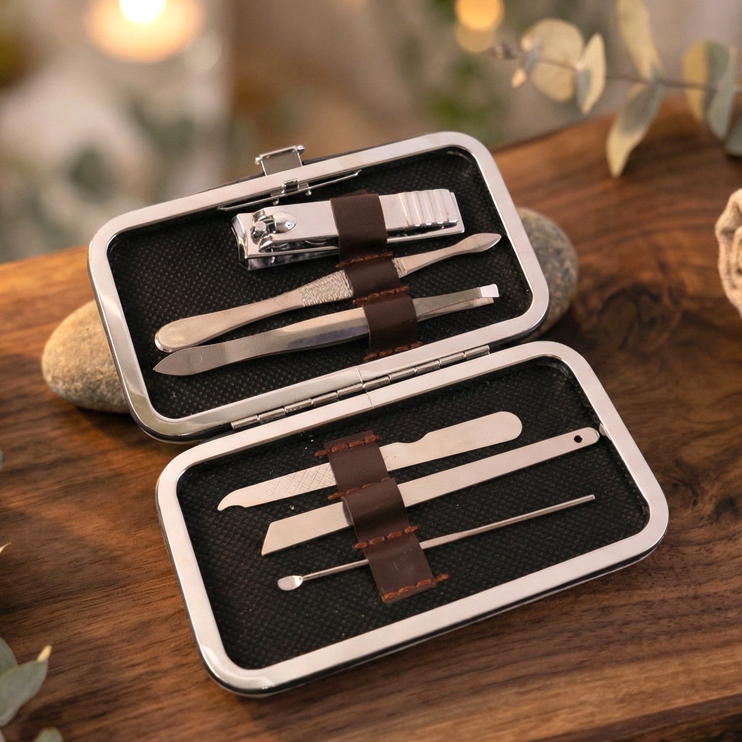 Wukusy 6-in-1 premium nail care manicure and pedicure grooming kit with various tools on a white background