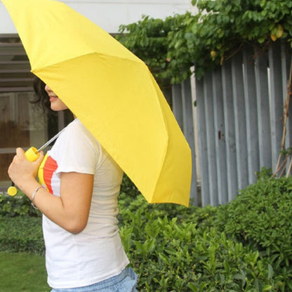 Wukusy stylish banana-shaped mini foldable travel umbrella open, featuring bright yellow canopy and compact design