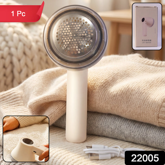 Wukusy rechargeable electric lint remover fabric shaver for clothes, sweaters, sofas, and blankets, with a compact design.