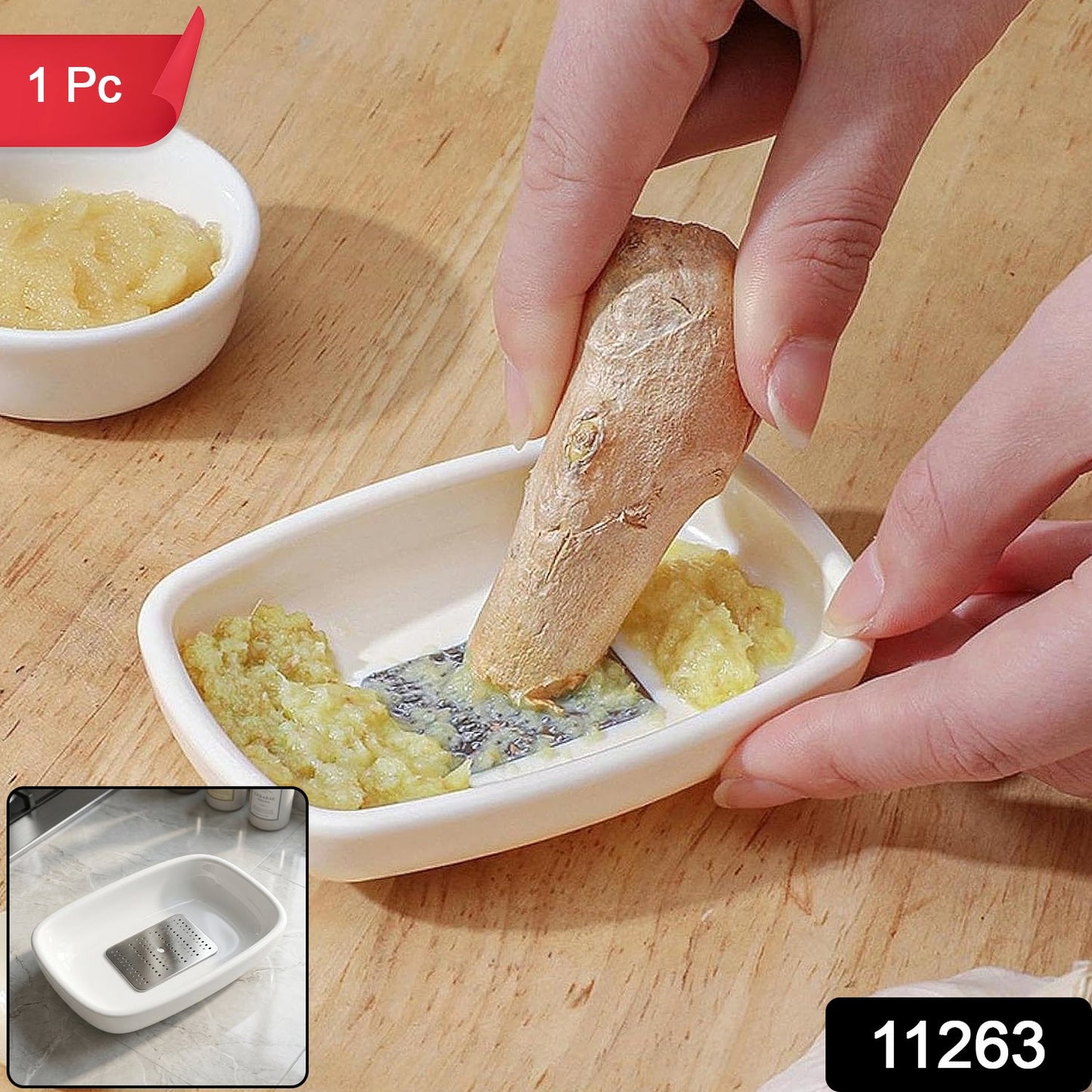 Wukusy garlic and ginger grater plate showing grated garlic and ginger on a white surface with the tool in use