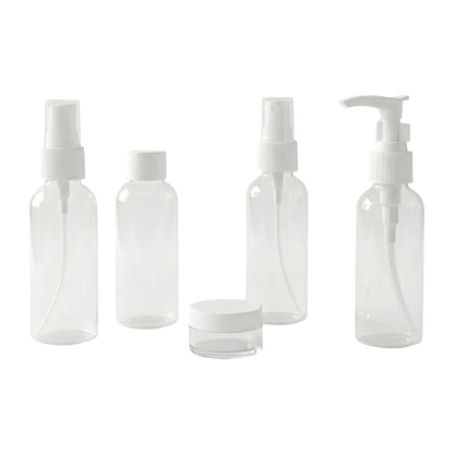 Wukusy 5-in-1 refillable travel cosmetic bottles set with clear containers and black caps for toiletries and skincare on the go.