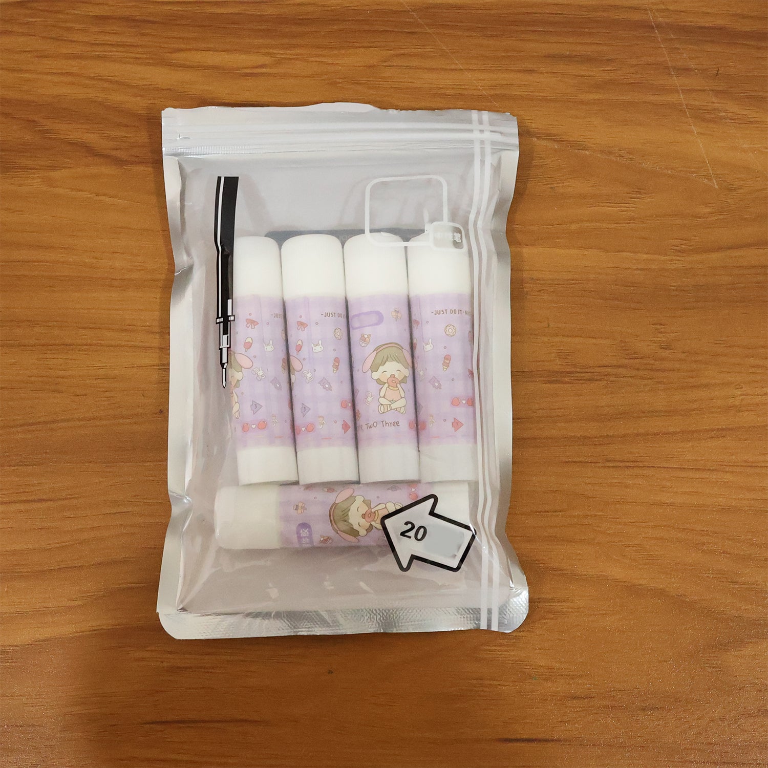 Wukusy cartoon-themed solid glue stick pack with five colorful glue sticks for arts and crafts projects