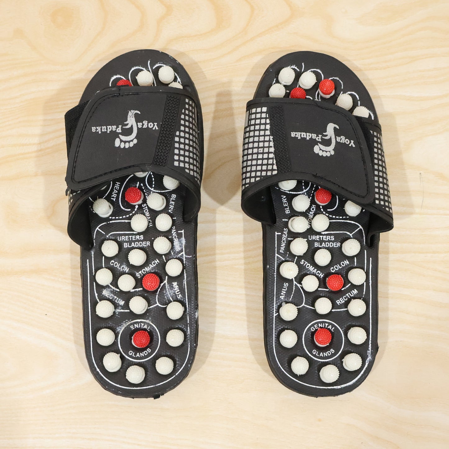 Pair of Wukusy acupressure foot massage slippers with textured insoles for reflexology and foot relief, size 8.