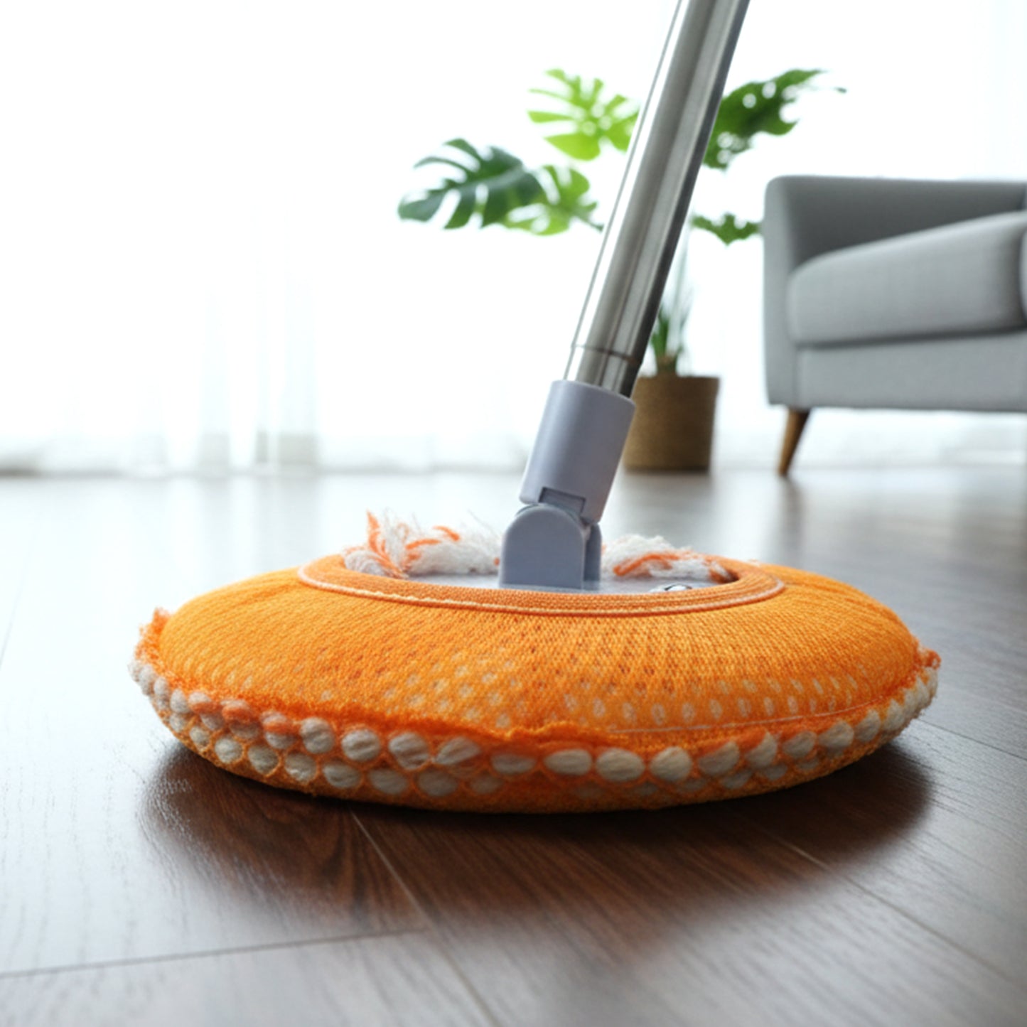 Wukusy multipurpose spin mop with white handle and bucket, ideal for cleaning floors and surfaces in a home or office setting.