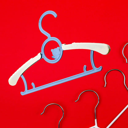 Set of 5 Wukusy large plastic adjustable child dress hangers for clothes, coats, and shirts, space-saving and lightweight for closets.