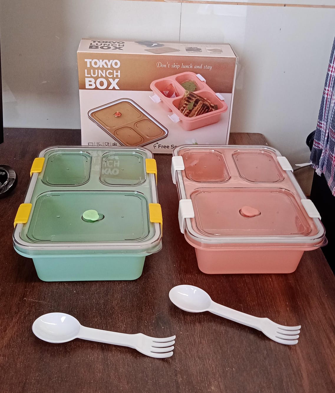 Wukusy 5627 plastic lunch box for kids with three compartments, insulated tiffin box ideal for school, boys, and girls.