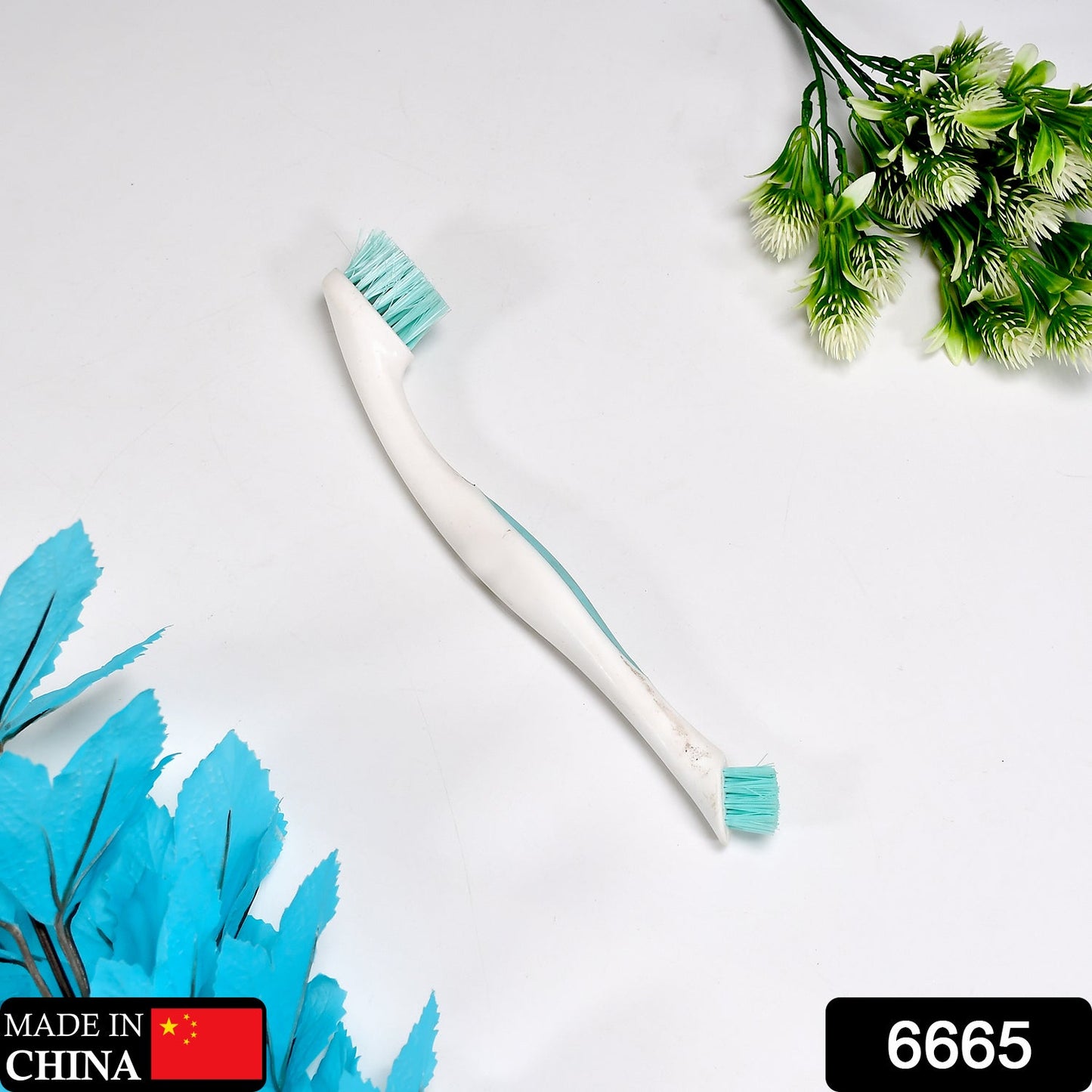 Wukusy 6665 multipurpose two-sided brush for home and kitchen cleaning, featuring durable bristles and ergonomic handle.