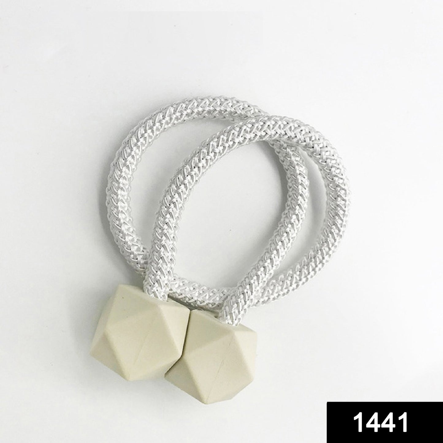 Two Wukusy hexagonal magnetic braided rope drapery loop ties for window curtains, showing the textured design and magnetic closure.