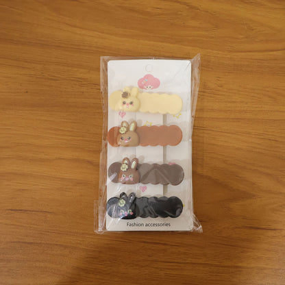 Set of four cute bunny cartoon decorative hair clips by Wukusy, perfect for kids' hairstyles and accessories.