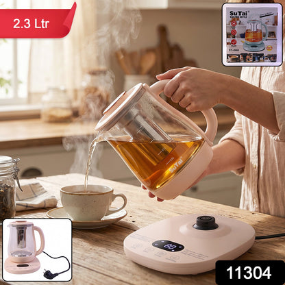 Wukusy Suta electric glass kettle with 2.3L capacity, tea infuser, and temperature control on a kitchen countertop.