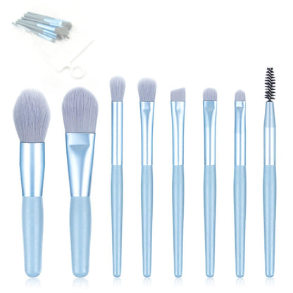 Wukusy 8-piece mini makeup brush set with case, includes synthetic brushes for foundation, blush, eyeshadow, and lipstick application.