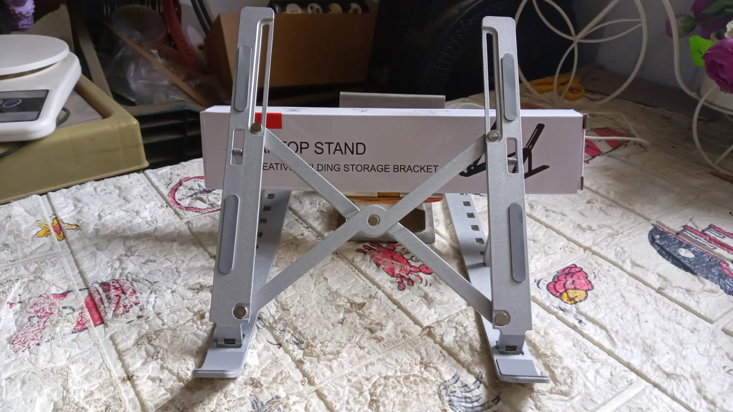 Wukusy 12874 metal laptop stand with 6 adjustable angles, portable design, also supports phones and tablets for home improvement.