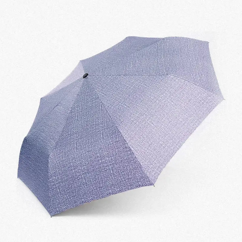 Ekom 3-fold children's umbrella with UV protection, rain and sun shield, foldable design, in zip case, ideal for travel and outdoor use.