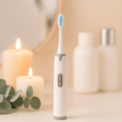 Wukusy battery-operated electric toothbrush with white handle and brush head for effective oral cleaning.