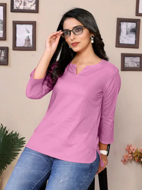 Baby pink cotton tunic for women with V-neck, round hem, hip length, and 3/4 sleeves, by Ekom, displayed on a model.