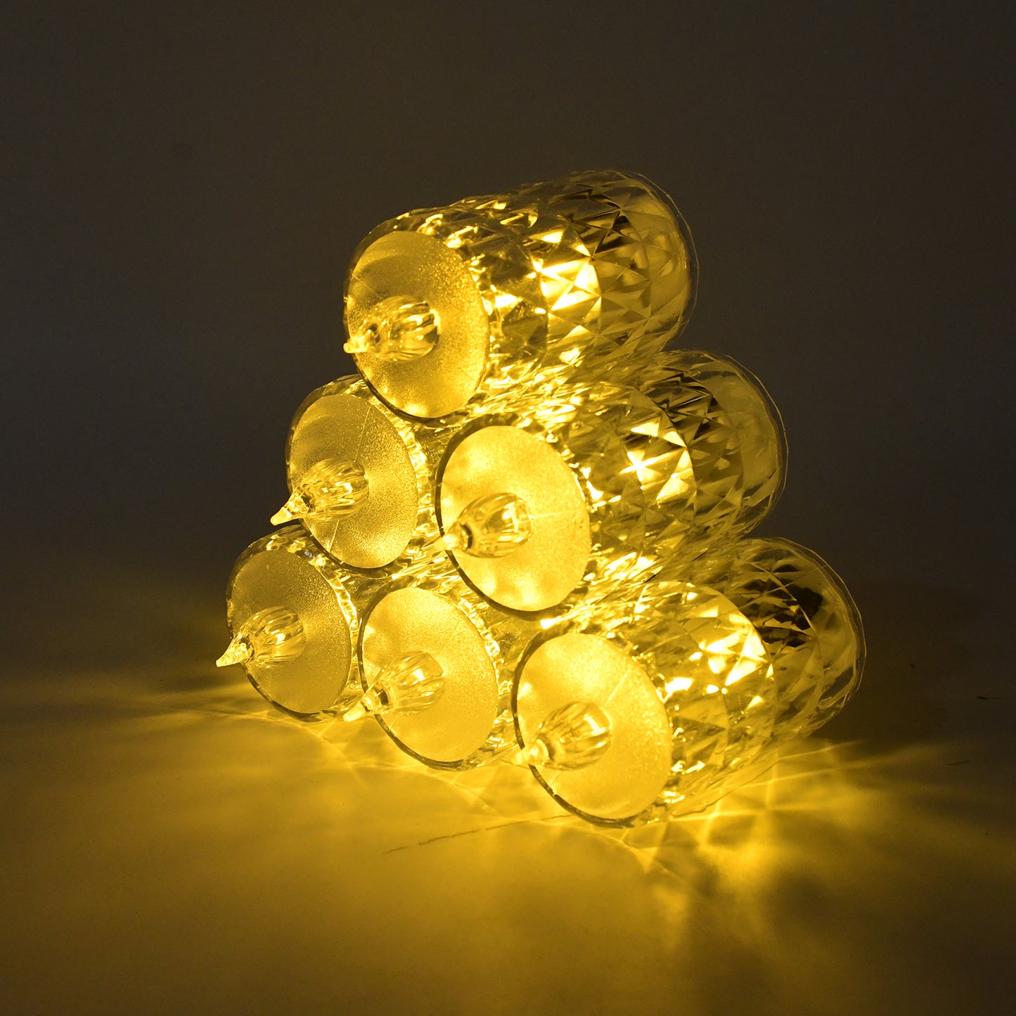 Wukusy LED crystal effect flameless candle light set with five realistic-looking candles emitting warm glow