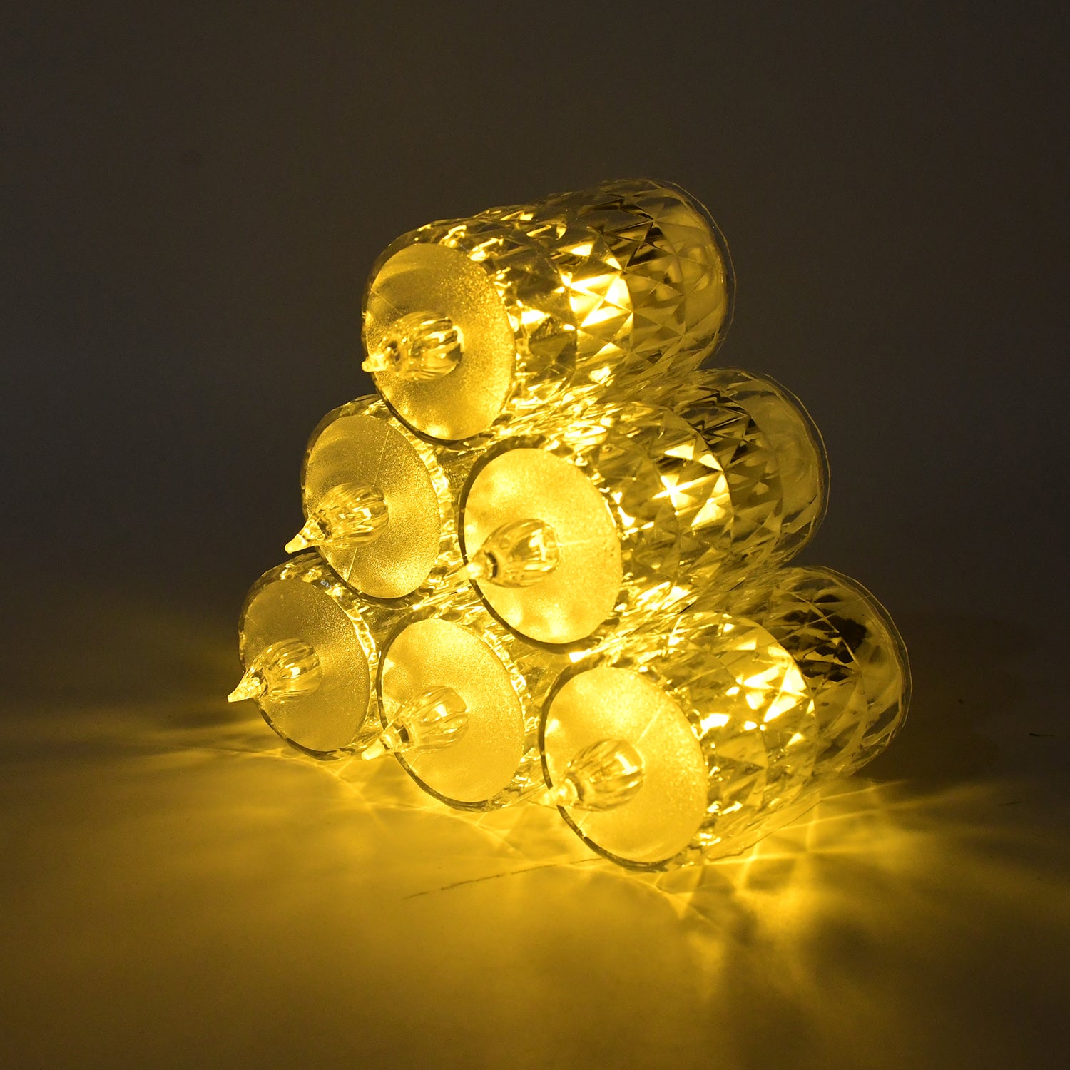 Wukusy LED crystal effect flameless candle light set with five realistic-looking candles emitting warm glow