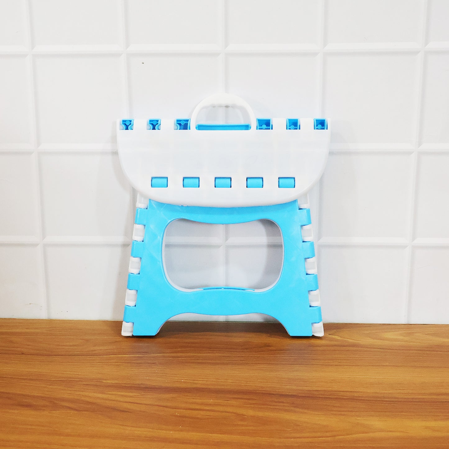 Wukusy multipurpose foldable step stool in grey, compact design with non-slip top for household use.