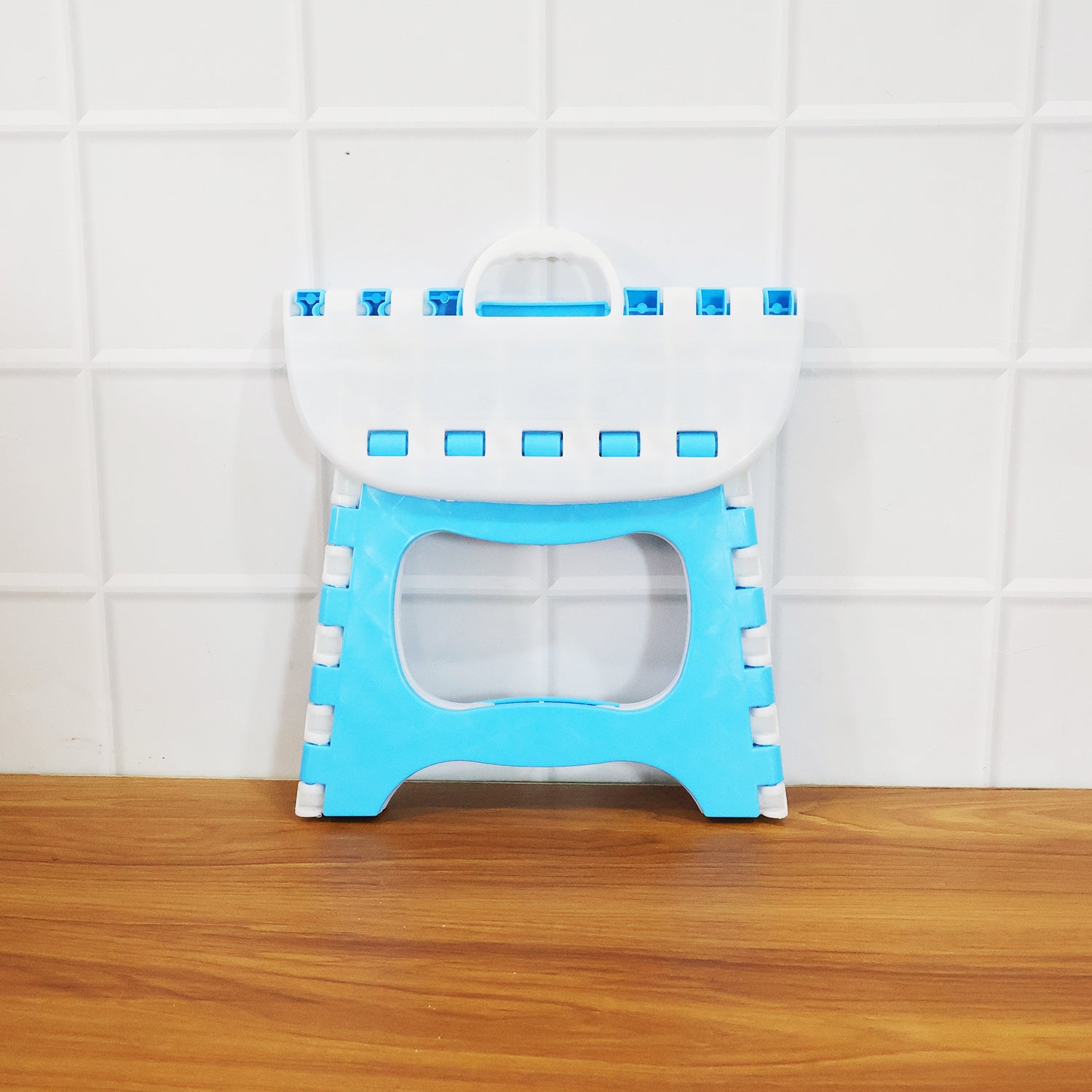 Wukusy multipurpose foldable step stool in grey, compact design with non-slip top for household use.