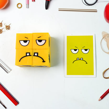 Wukusy educational face expression changing puzzle cube toy set with colorful cubes showing various facial expressions.