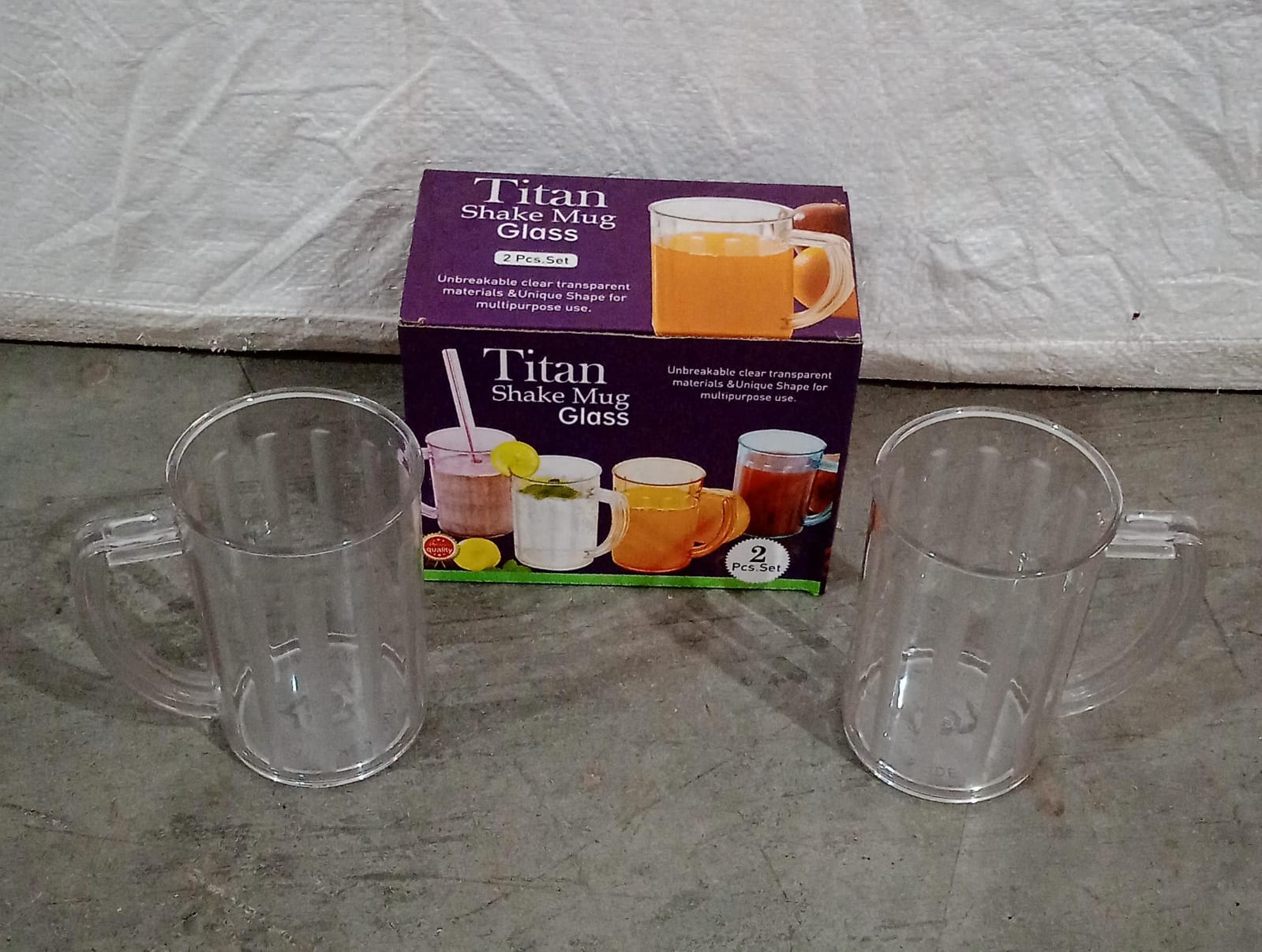 Wukusy 5579 clear juice glasses with handles, unbreakable plastic beer mugs, ideal for kids, multipurpose home and kitchen use.