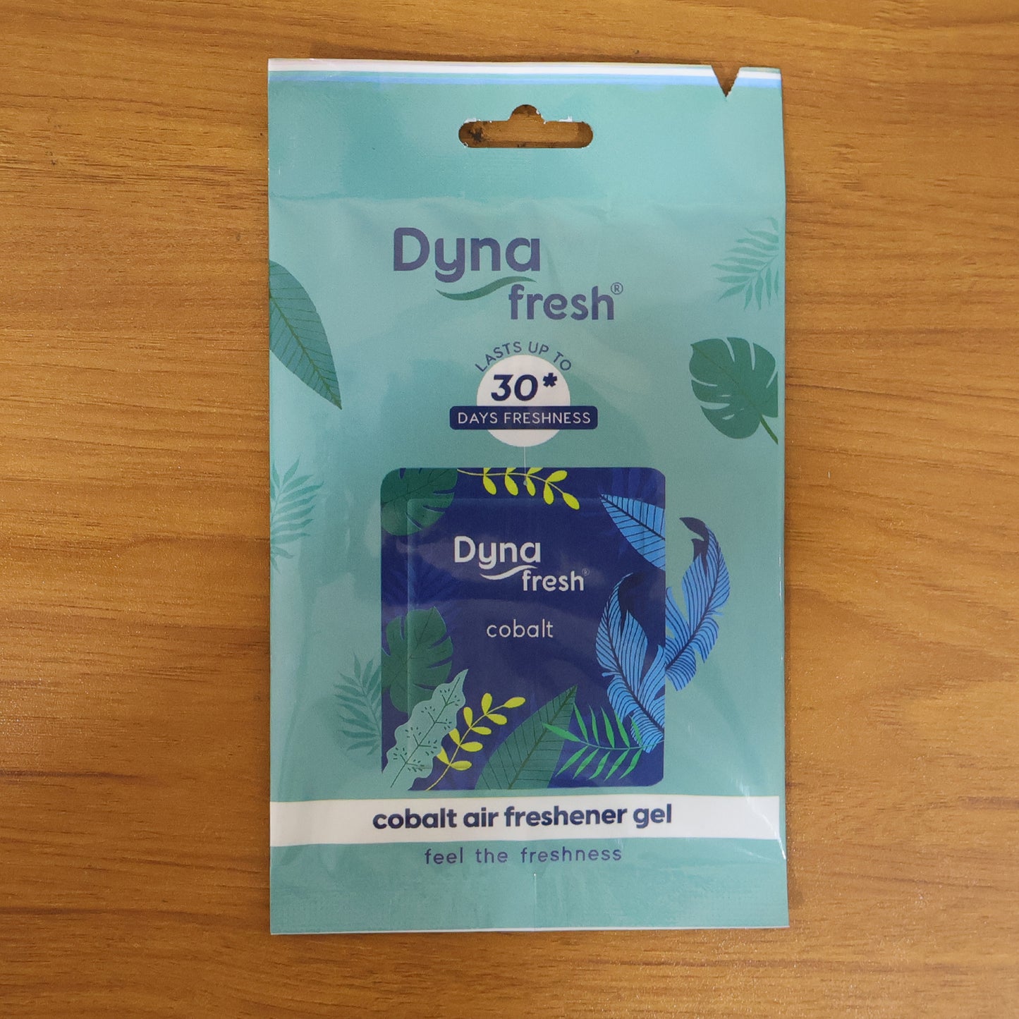 Cobalt hanging air freshener gel by Wukusy, 10g, with a vibrant blue design and hanging string for freshening spaces.