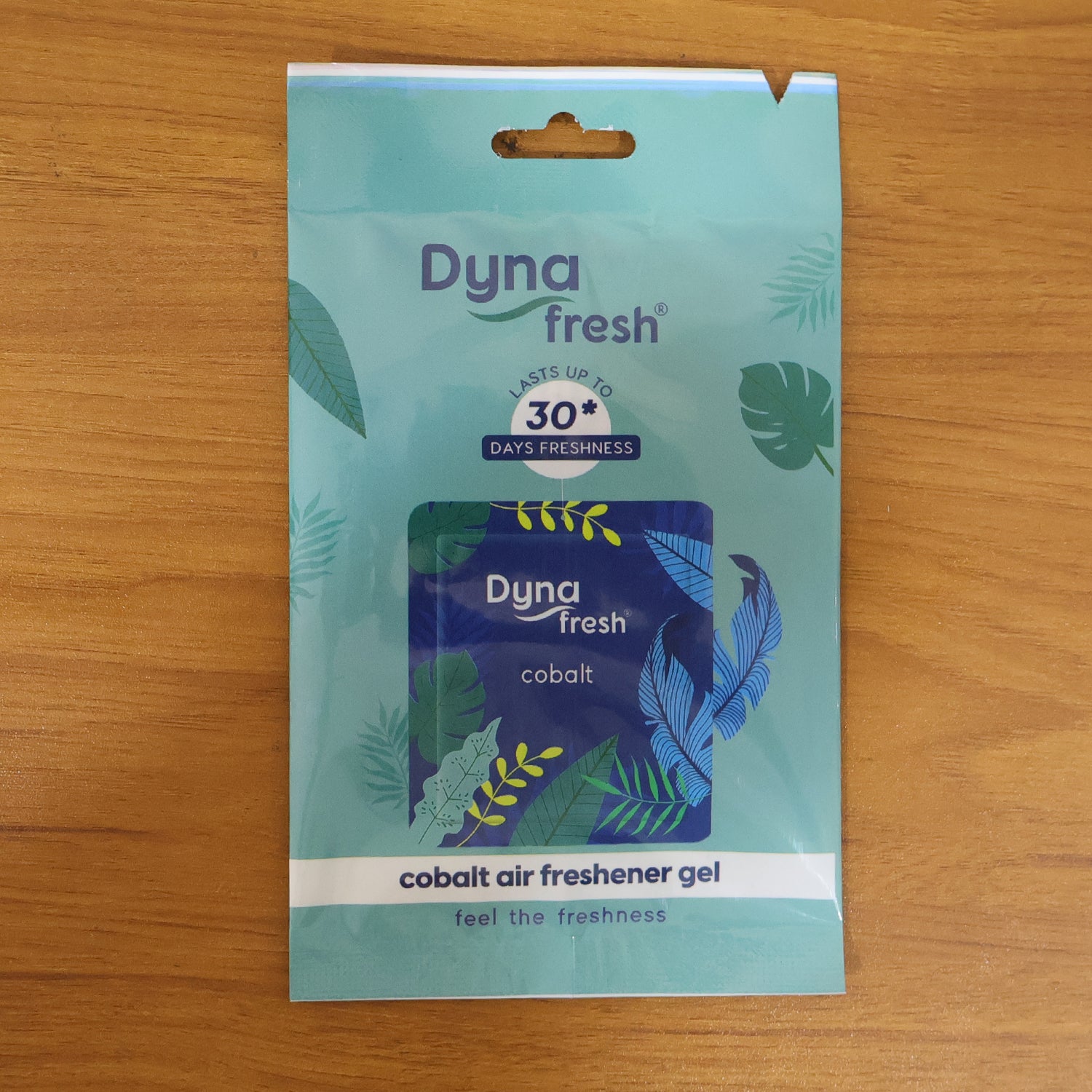 Cobalt hanging air freshener gel by Wukusy, 10g, with a vibrant blue design and hanging string for freshening spaces.