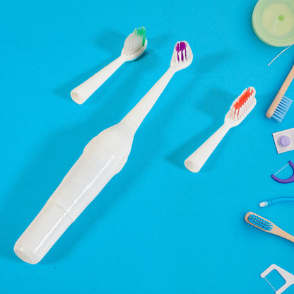 Wukusy 7324 electric toothbrush for adults and teens with multiple brush heads and deep cleansing action, battery operated (battery not included).