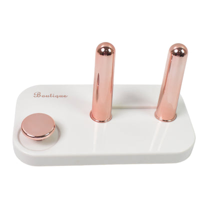 Wukusy wall-mounted hair dryer holder with self-adhesive backing, designed for convenient home bathroom organization.