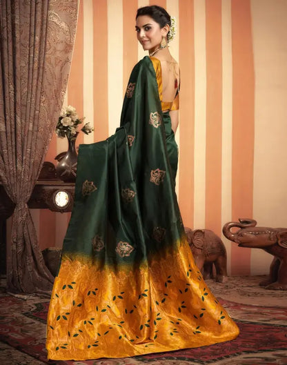 Elegant green and gold silk saree from Ekom's Royal Green Golden Elegance Collection, showcasing intricate traditional design.