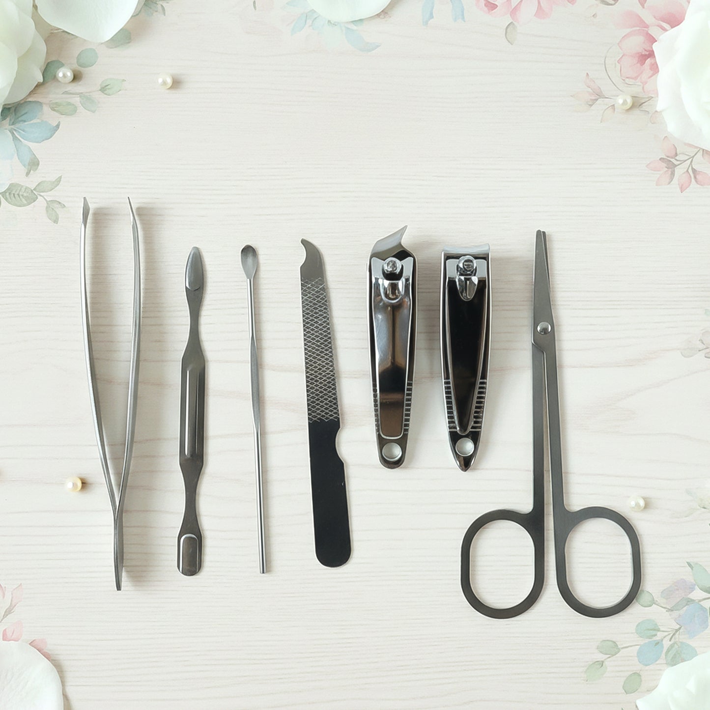 Wukusy 7-in-1 stainless steel manicure and pedicure grooming kit with various precision tools arranged inside a case