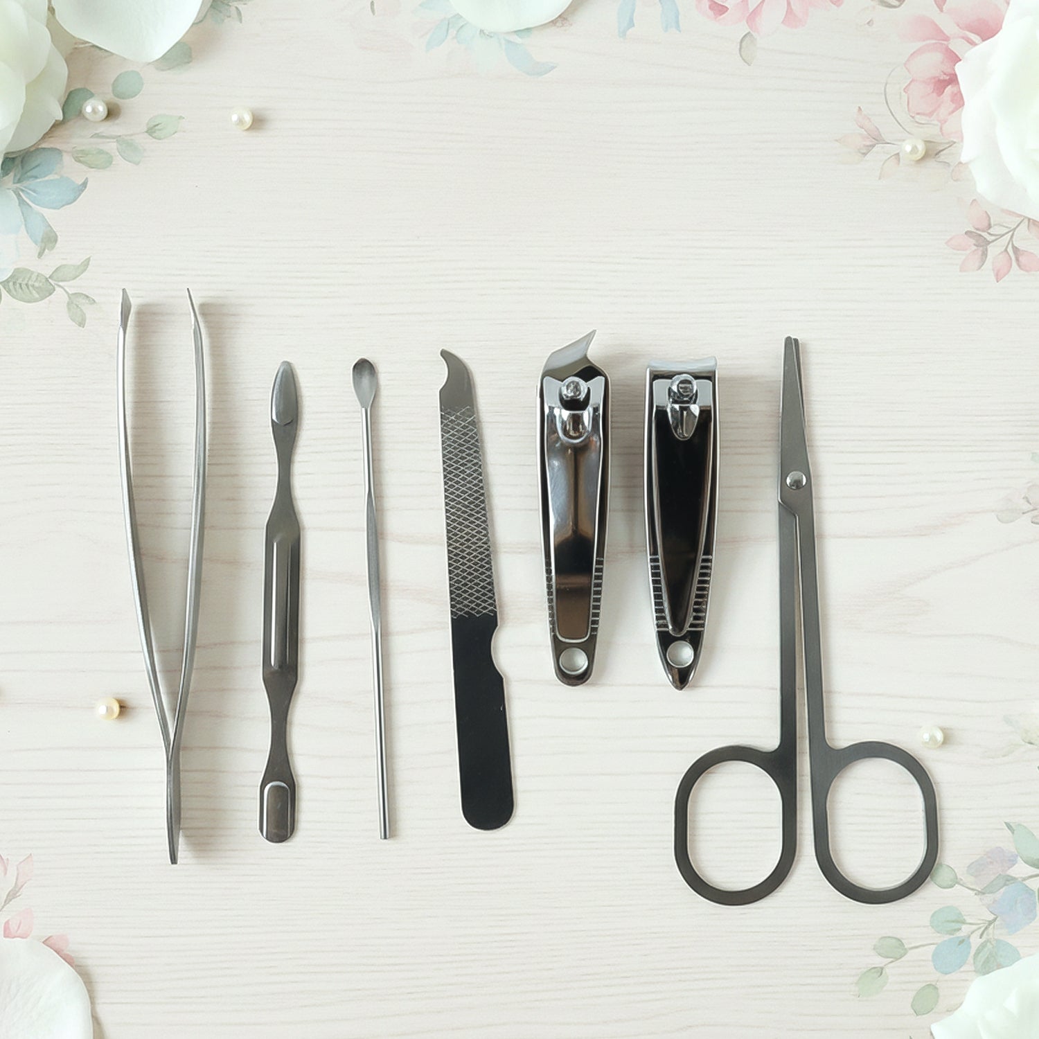 Wukusy 7-in-1 stainless steel manicure and pedicure grooming kit with various precision tools arranged inside a case