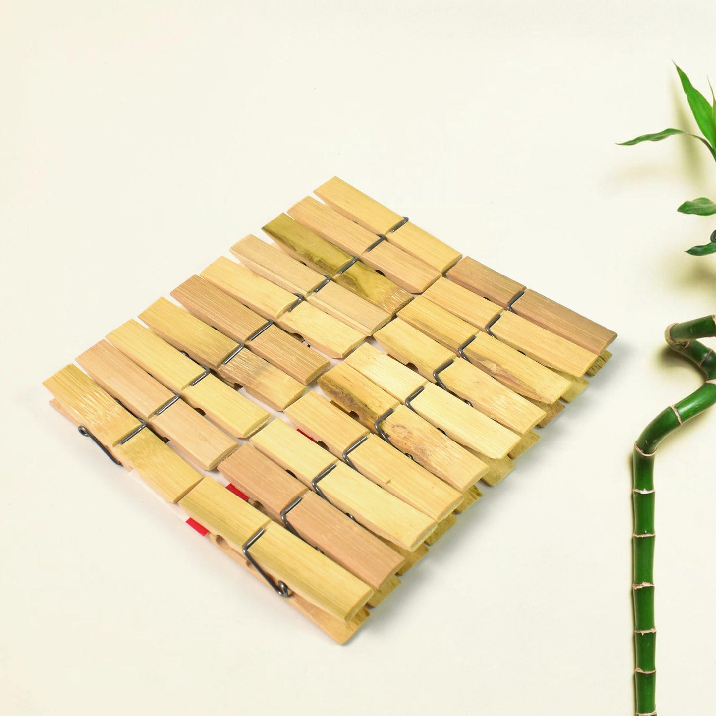 Set of 20 heavy duty bamboo wooden cloth clips or pegs by Wukusy, showing sturdy, natural bamboo construction and versatile laundry use.