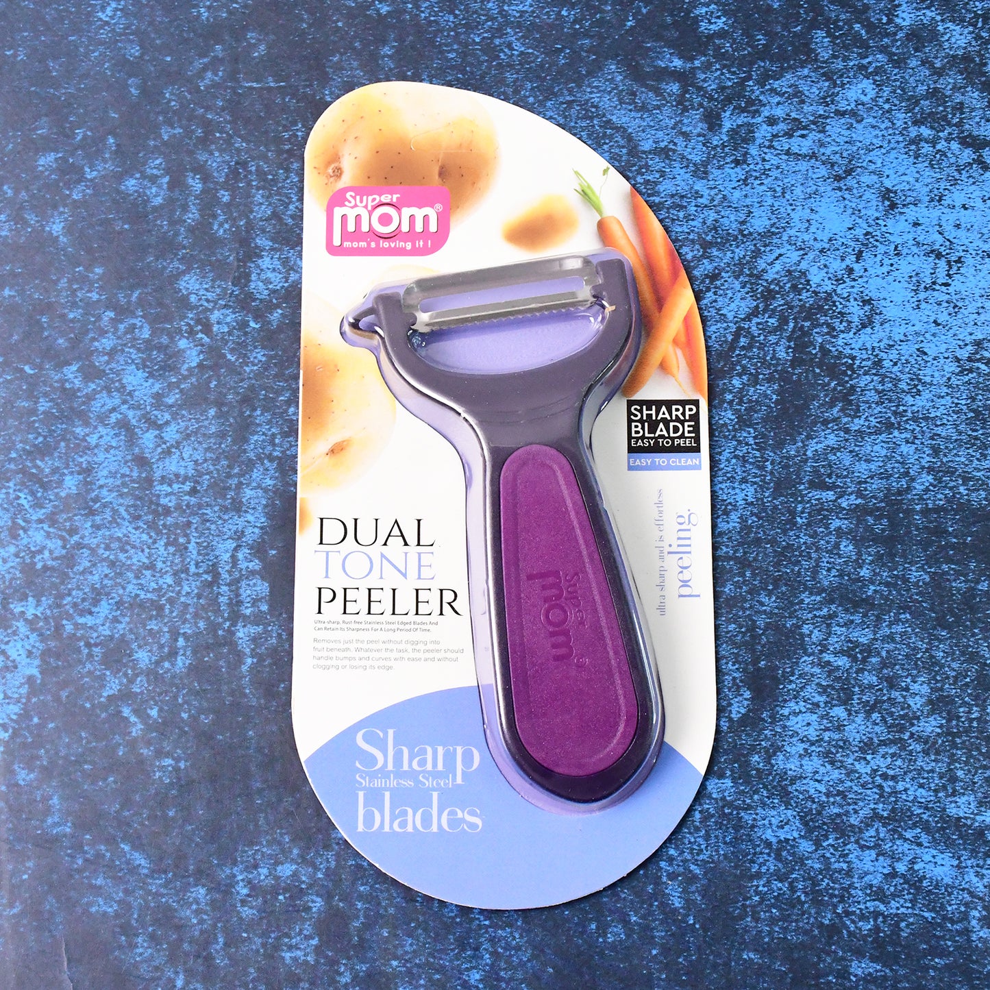 Wukusy Supermom dual tone peeler with ultra-sharp stainless steel blade for peeling vegetables and fruits in the kitchen.