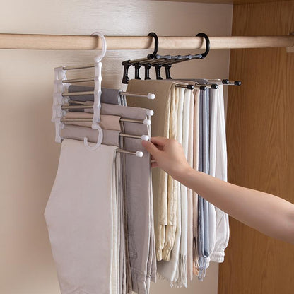 Wukusy adjustable trouser pants hanger organizer with multiple clips for hanging and organizing pants or trousers.