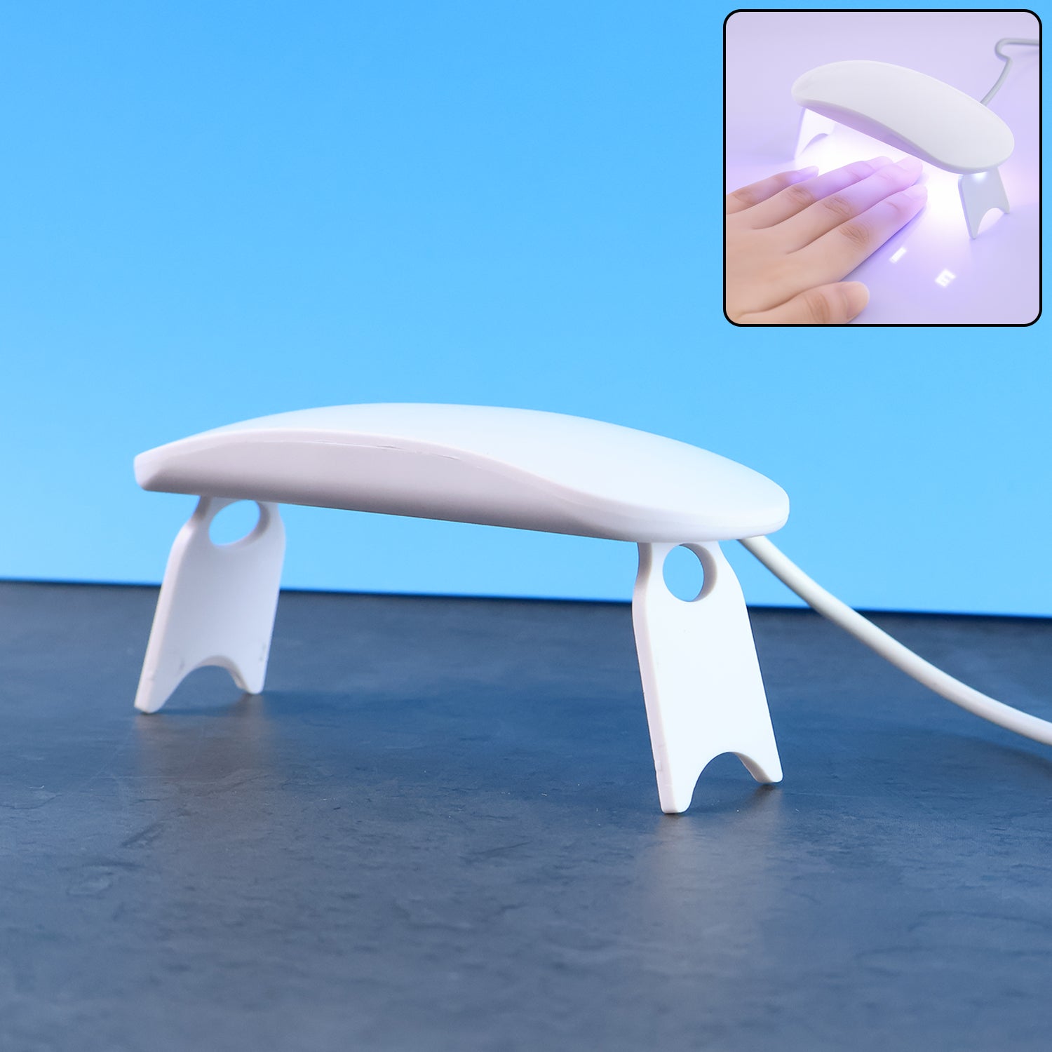 Wukusy mini portable UV LED nail lamp for gel nail polish curing, compact design with multiple LED bulbs for quick drying.