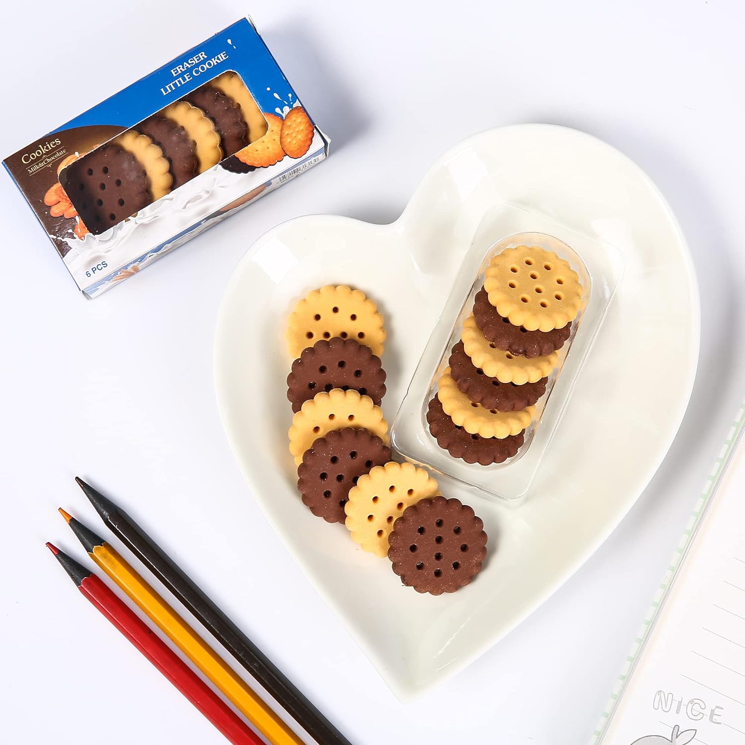 Wukusy pack of 6 biscuit-shaped erasers for stationery, ideal for school, office, or gifts, featuring creative design and bright colors.
