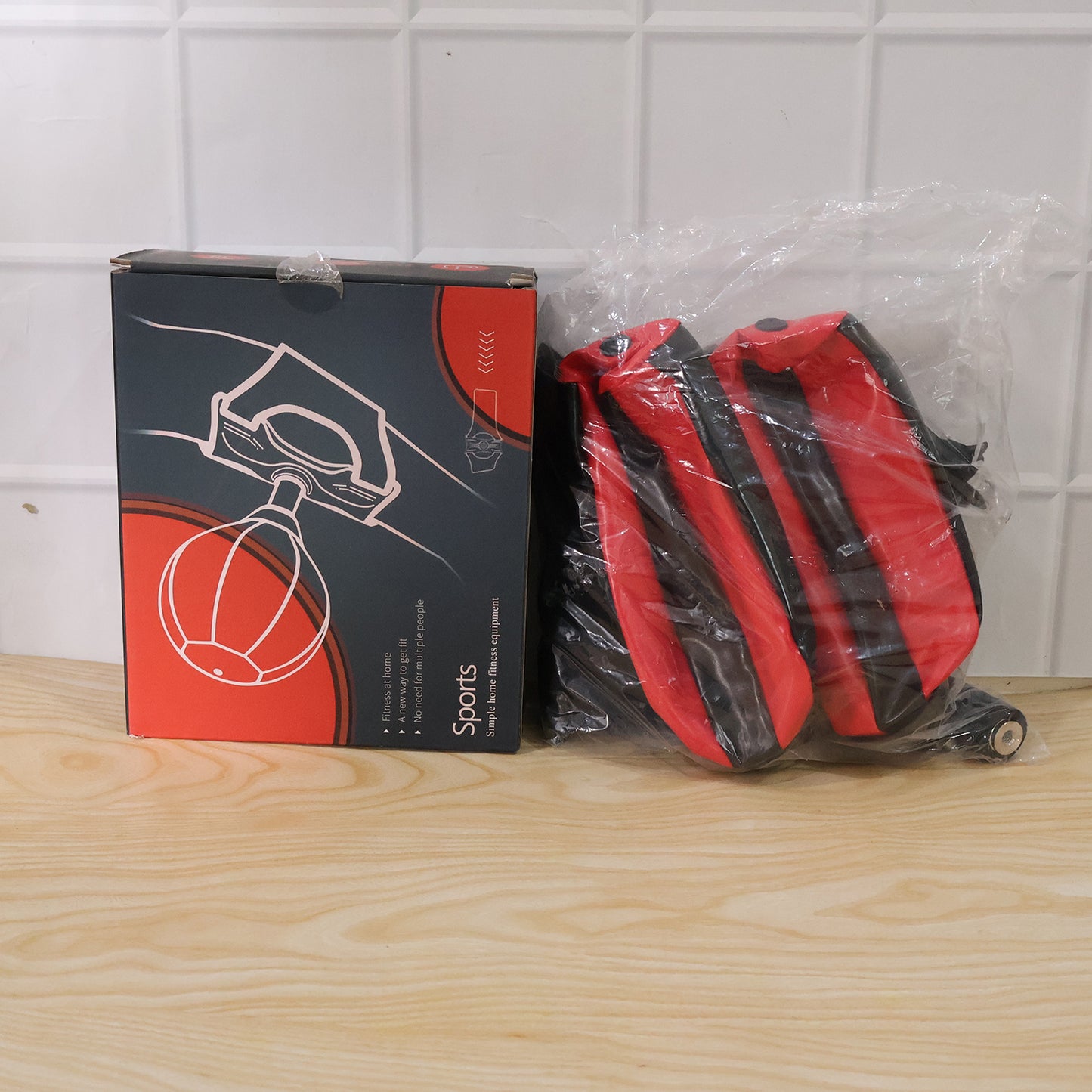 Wukusy portable B-grade inflatable punching bag with air pump, shown deflated and ready for setup.