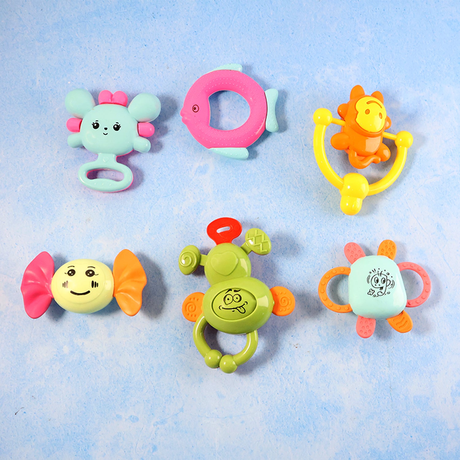 Wukusy Tiny Joys 6-in-1 baby rattle toy set with colorful, textured rattles for infants to grasp and shake.