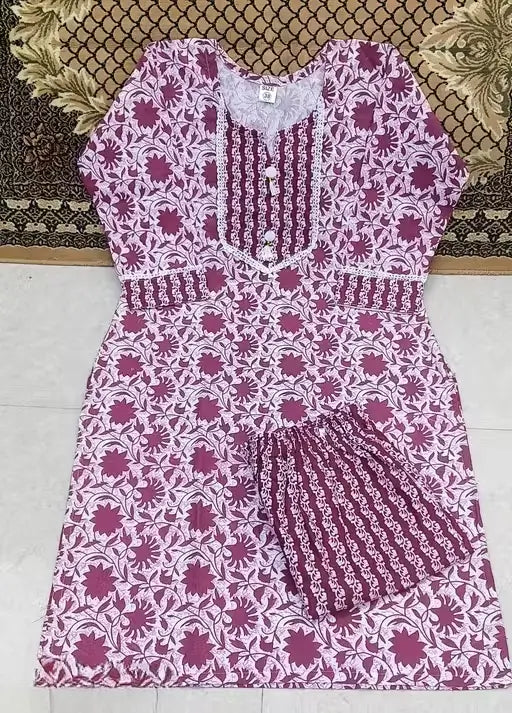 Women’s purple cotton kurti set with maroon pants, floral print, three-quarter sleeves, suitable for daily wear, by Ekom
