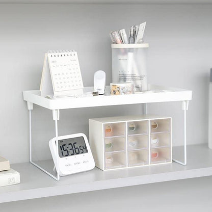 Wukusy plastic bathroom and kitchen organizer storage rack with multiple compartments for countertop organization.
