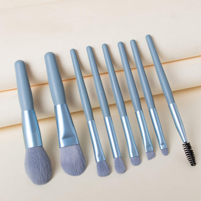 Wukusy 8-piece mini makeup brush set with case featuring synthetic bristles for foundation, blush, eyeshadow, and lipstick application.