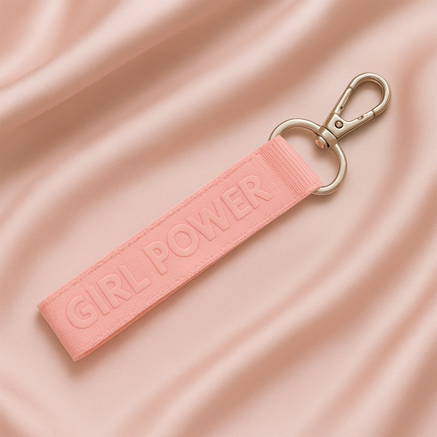 Fabric ribbon keychain in mixed colors with office-themed design, by Wukusy, attached to a keyring.