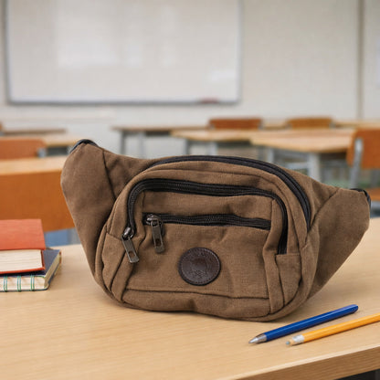 Stylish Wukusy canvas waist bag for men and women with adjustable strap and multiple compartments, perfect for casual use.