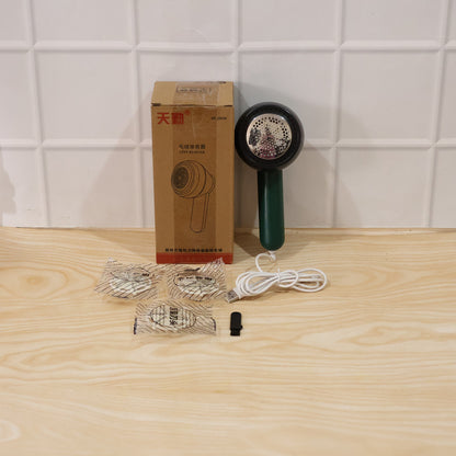 Wukusy electric lint remover with cleaning brush, handheld device for removing lint and pet hair from fabrics and clothing.