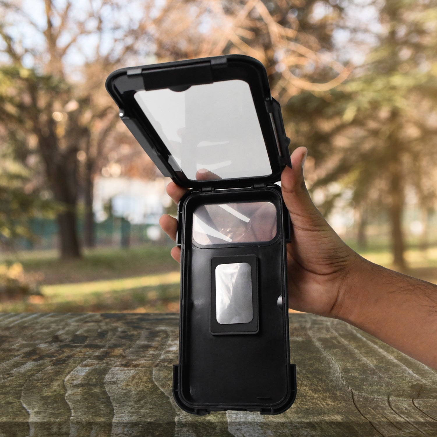 Wukusy 360 rotation waterproof bike phone mount holding a smartphone securely during outdoor cycling.