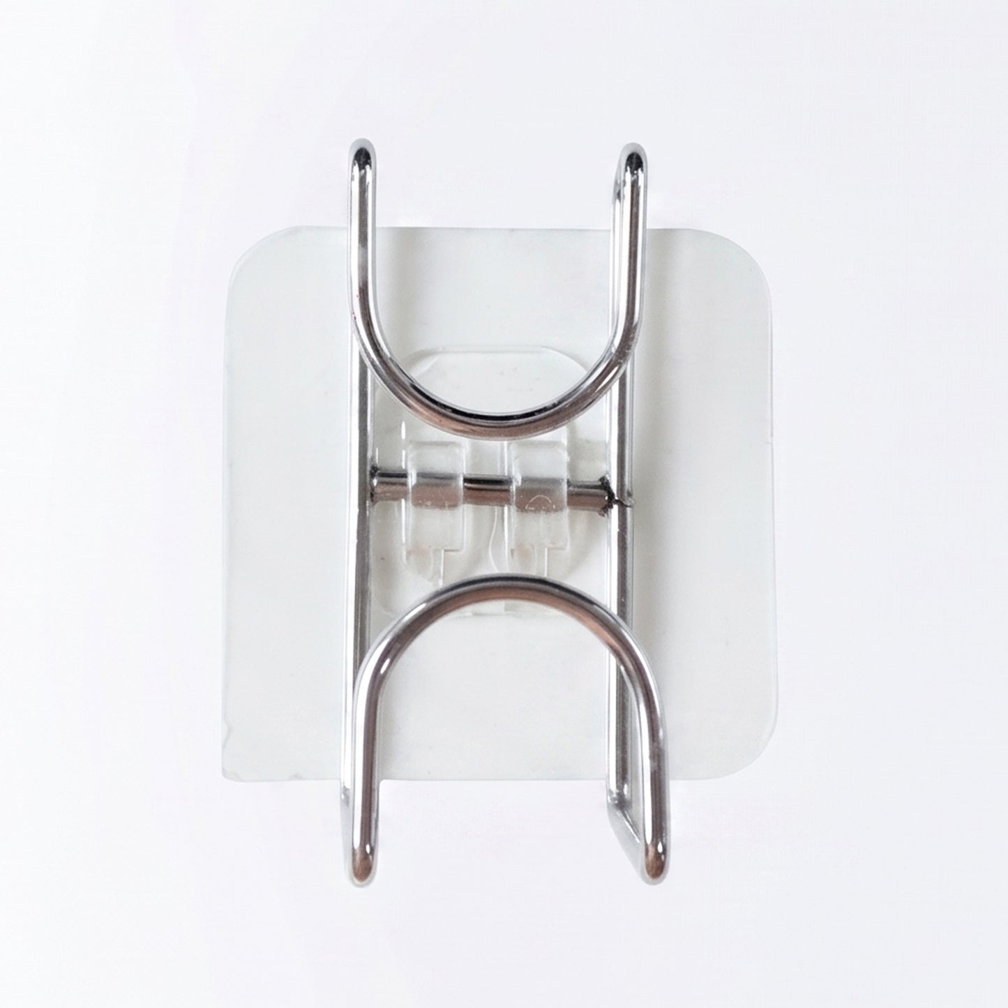 Transparent double loop adhesive wall hook by Wukusy, mounted on a wall with the hook loops visible for hanging items.