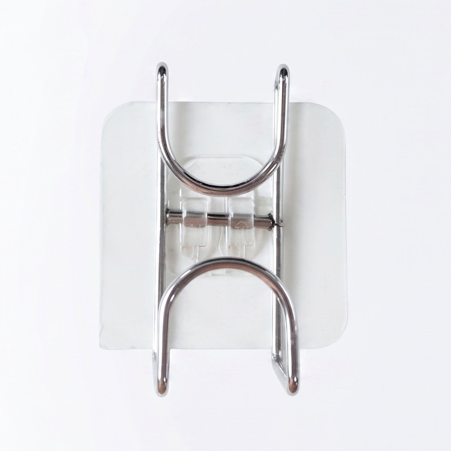 Transparent double loop adhesive wall hook by Wukusy, mounted on a wall with the hook loops visible for hanging items.