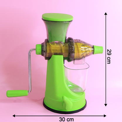 Wukusy Supermom manual multi-functional fruit and vegetable juicer on kitchen countertop, showing its compact design and hand-crank mechanism.